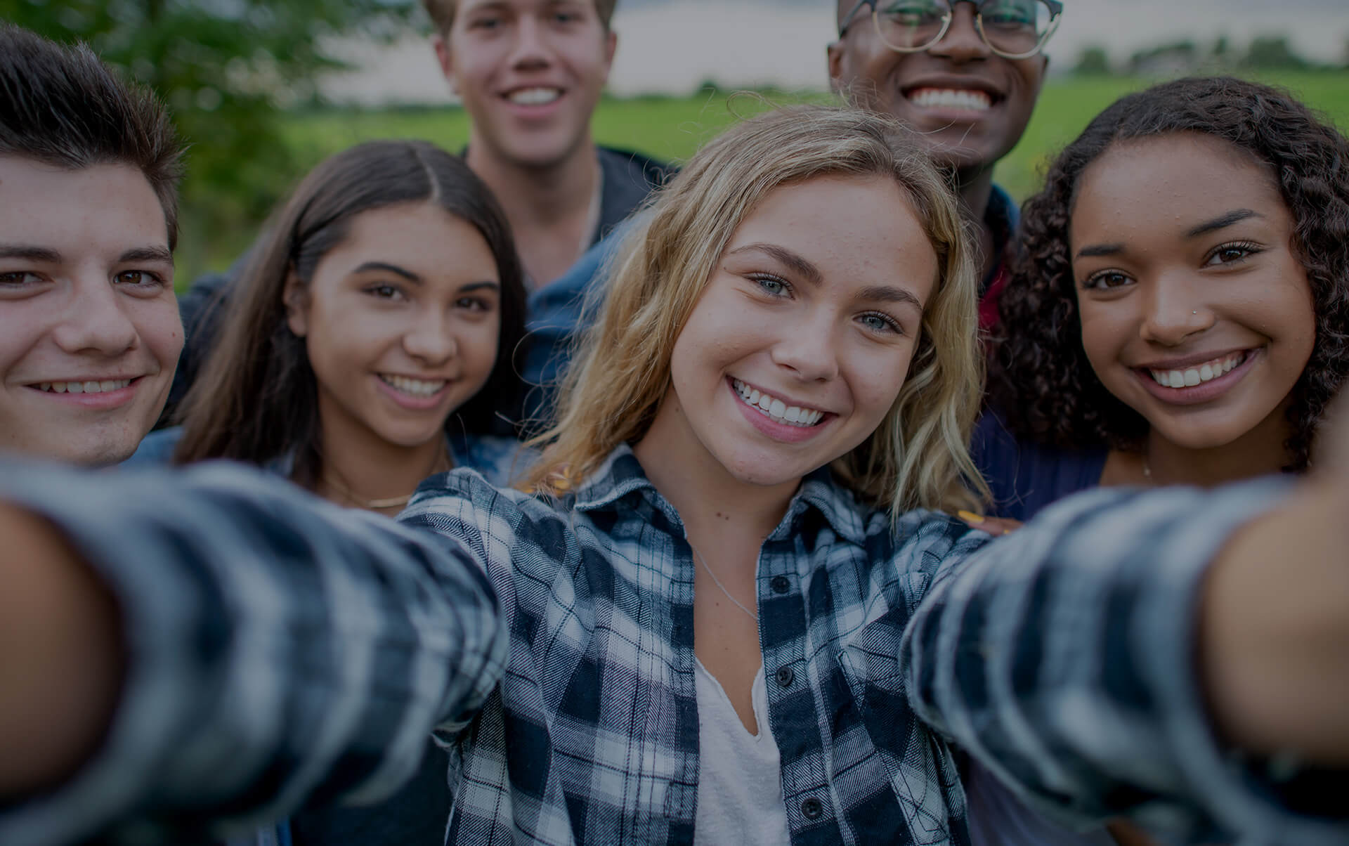 group of smiling teenagers