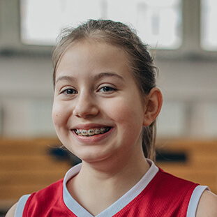 smiling girl with braces