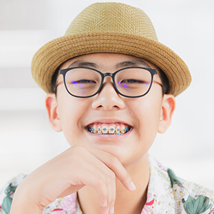 smiling boy with braces