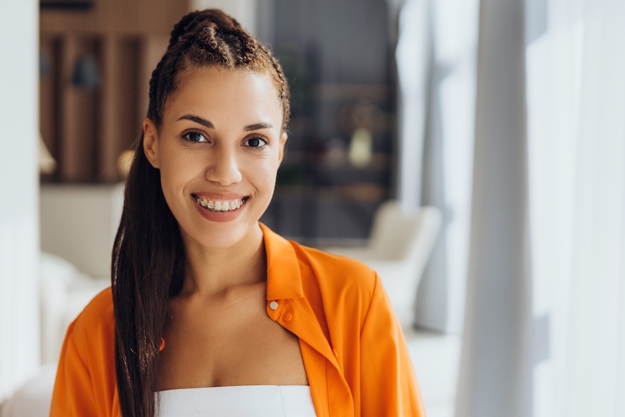woman in braces how long does orthodontic treatment take